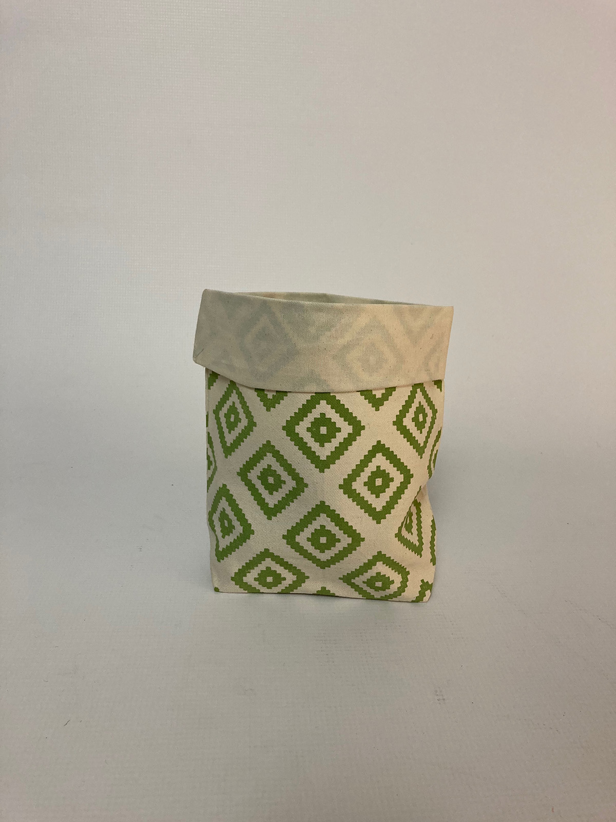 Plant bag with green geometric print