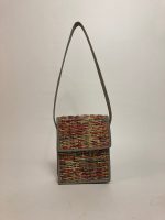 Woven newspaper shoulder bag